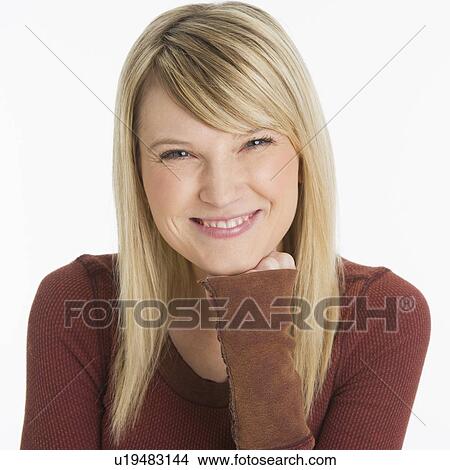 Studio portrait of smiling woman View Large Photo Image Picture - Studio portrait of smiling woman. Fotosearch