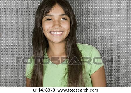 Studio portrait of teenage (16-17) girl View Large Photo Image Stock Photo - Studio portrait of teenage (16-17) girl. Fotosearch
