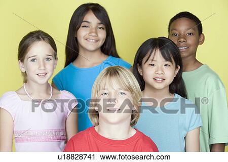 Studio portrait of teenage (16-17) kids View Large Photo Image Stock Image - Studio portrait of teenage (16-17) kids. Fotosearch