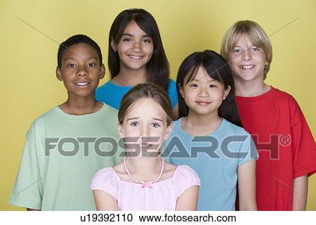 Studio portrait of teenage (16-17) kids View Large Photo Image Stock Image - Studio portrait of teenage (16-17) kids. Fotosearch