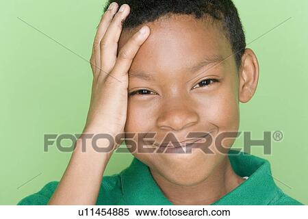 Studio portrait of teenage boy smiling View Large Photo Image Stock Photography - Studio portrait of teenage boy smiling. Fotosearch