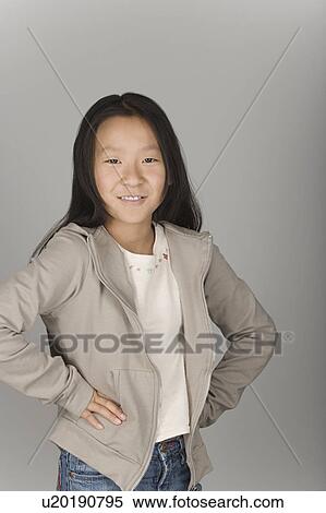 Studio portrait of teenage girl View Large Photo Image Stock Photography - Studio portrait of teenage girl. Fotosearch