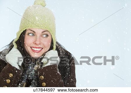 Studio portrait of woman in winter clothing View Large Photo Image Stock Photo - Studio portrait of woman in winter clothing. Fotosearch