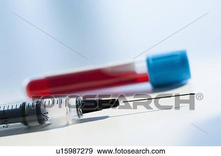 Studio shot of blood sample and syringe View Large Photo Image Stock Photo - Studio shot of blood sample and syringe. Fotosearch