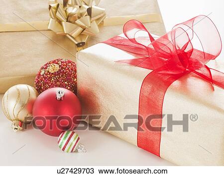 Studio shot of Christmas ornaments and presents View Large Photo Image Stock Image - Studio shot of Christmas ornaments and presents. Fotosearch