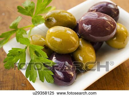 Stock Photography - Studio shot of fresh olives. Fotosearch