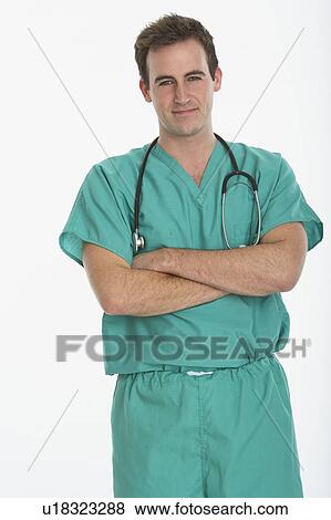 Stock Photo - Studio shot of male doctor. Fotosearch