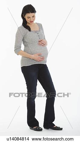 Picture - Studio shot of pregnant woman. Fotosearch