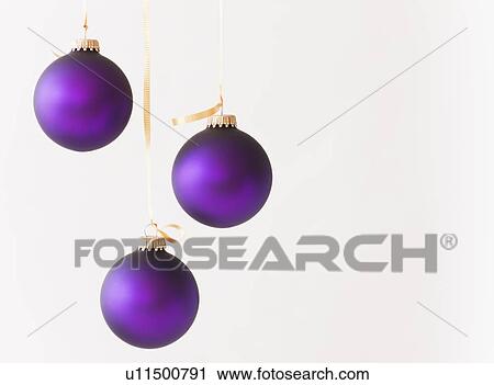 Studio shot of purple Christmas ornaments View Large Photo Image Stock Image - Studio shot of purple Christmas ornaments. Fotosearch