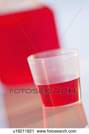 Studio shot of red medicine View Large Photo Image Stock Image - Studio shot of red medicine. Fotosearch