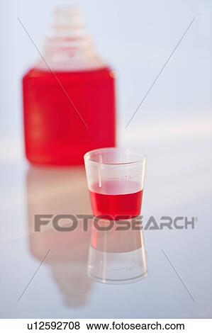 Studio shot of red medicine View Large Photo Image Stock Photo - Studio shot of red medicine. Fotosearch
