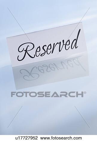 Stock Image - Studio shot of reserved sign. Fotosearch