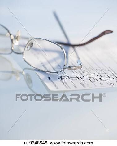 Studio shot of spectacles and prescription View Large Photo Image Stock Photography - Studio shot of spectacles and prescription. Fotosearch