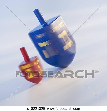 Studio Shot of spinning dreildels View Large Photo Image Stock Image - Studio Shot of spinning dreildels. Fotosearch