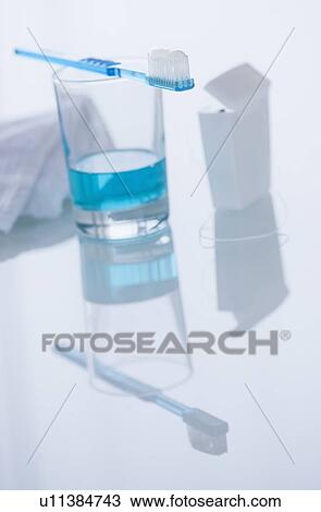 Studio shot of toothbrush and glass View Large Photo Image Stock Image - Studio shot of toothbrush and glass. Fotosearch