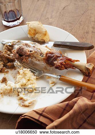 Stock Image - Studio shot of turkey leg with potatoes. Fotosearch