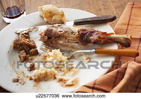 Stock Photograph - Studio shot of turkey leg with potatoes. Fotosearch