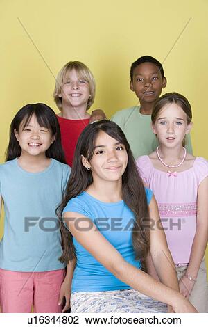 Studio shot portrait of five teenagers, three quarter length View Large Photo Image Stock Image - Studio shot portrait of five teenagers, three quarter length. Fotosearch