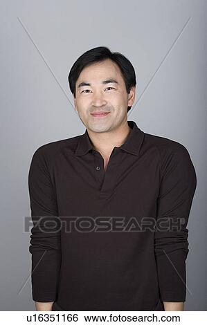 Studio shot portrait of mature man, waist up View Large Photo Image Stock Photograph - Studio shot portrait of mature man, waist up. Fotosearch