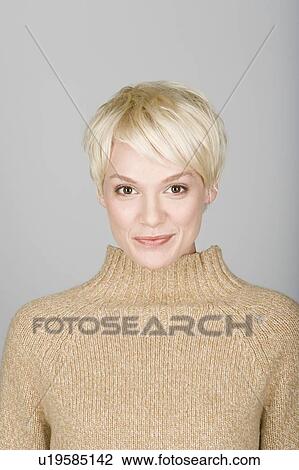 Studio shot portrait of mid adult woman, head and shoulders View Large Photo Image Stock Image - Studio shot portrait of mid adult woman, head and shoulders. Fotosearch