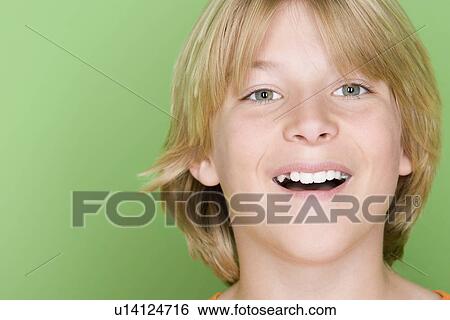 Studio shot portrait of teenage boy, close-up View Large Photo Image Stock Photograph - Studio shot portrait of teenage boy, close-up. Fotosearch