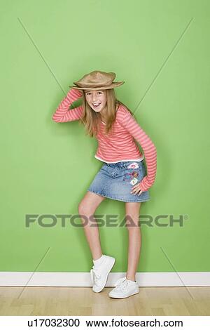 Studio shot portrait of teenage girl, full length View Large Photo Image Stock Image - Studio shot portrait of teenage girl, full length. Fotosearch