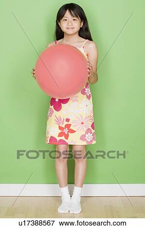 Studio shot portrait of teenage girl, full length View Large Photo Image Stock Photo - Studio shot portrait of teenage girl, full length. Fotosearch