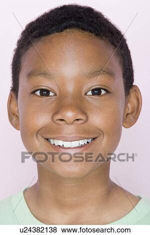 Studio shot portrait of young adult man, close-up View Large Photo Image Stock Photo - Studio shot portrait of young adult man, close-up. Fotosearch