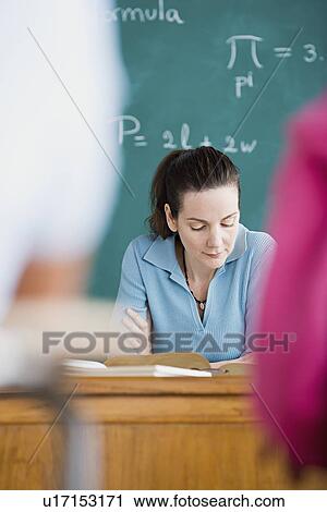 Teacher in classroom View Large Photo Image Stock Image - Teacher in classroom. Fotosearch