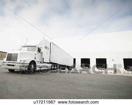 Stock Photo - Truck loading in warehouse. Fotosearch