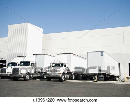 Trucks and warehouse View Large Photo Image Stock Image - Trucks and warehouse. Fotosearch