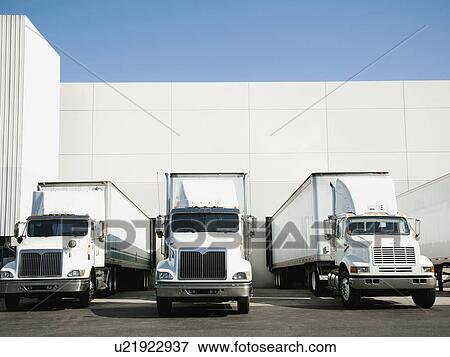 Stock Photo - Trucks and warehouse. Fotosearch