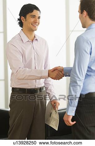 Two businessman shaking hands View Large Photo Image Stock Image - Two businessman shaking hands. Fotosearch