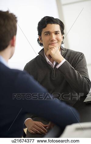 Two businessmen in discussion View Large Photo Image Stock Photo - Two businessmen in discussion. Fotosearch
