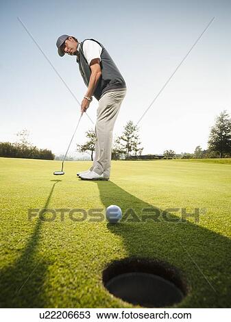 USA, California, Mission Viejo, Man playing golf View Large Photo Image Stock Image - USA, California, Mission Viejo, Man playing golf. Fotosearch