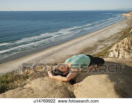 USA, California, San Diego, Woman practicing yoga on beach View Large Photo Image Stock Image - USA, California, San Diego, Woman practicing yoga on beach. Fotosearch