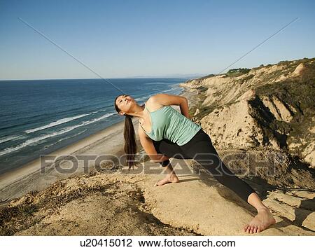 USA, California, San Diego, Woman practicing yoga on beach View Large Photo Image Stock Image - USA, California, San Diego, Woman practicing yoga on beach. Fotosearch