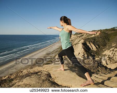 USA, California, San Diego, Woman practicing yoga on beach View Large Photo Image Stock Image - USA, California, San Diego, Woman practicing yoga on beach. Fotosearch