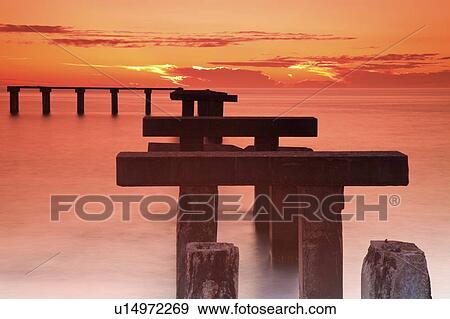 USA, Florida, Boca Grande, Ruined pier at sunset View Large Photo Image Stock Photo - USA, Florida, Boca Grande, Ruined pier at sunset. Fotosearch