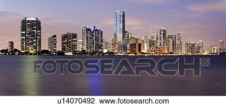 Stock Image - USA, Florida, Miami skyline at dusk. Fotosearch