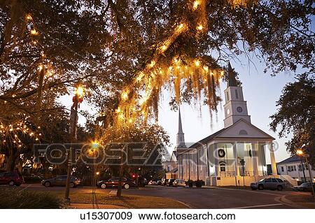 USA, Florida, Tallahassee, Church with lights on tree View Large Photo Image Stock Photo - USA, Florida, Tallahassee, Church with lights on tree. Fotosearch