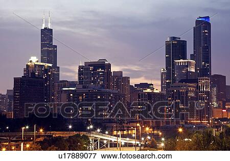 Stock Photo - USA, Illinois, Chicago skyline at dusk. Fotosearch