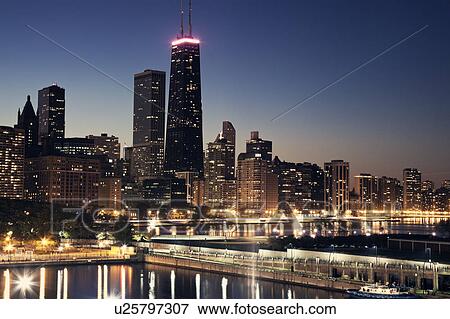 Stock Photo - USA, Illinois, Chicago skyline at dusk. Fotosearch