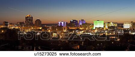 Stock Photography - USA, New Mexico, Albuquerque, Panoramic cityscape at dusk. Fotosearch