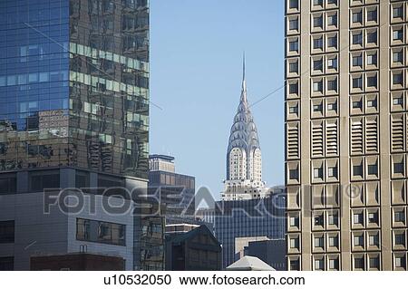 Stock Image - USA, New York, New York City, Manhattan, Skyline with Chrysler Building. Fotosearch