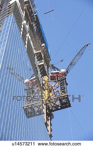 Stock Image - Usa, New York State, New York City, low angle view of skyscraper construction. Fotosearch