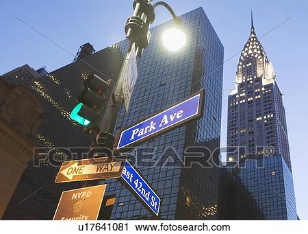 USA, New York State, New York City, low angle view of Chrysler Building and street name sign View Large Photo Image Stock Image - USA, New York State, New York City, low angle view of Chrysler Building and street name sign. Fotosearch