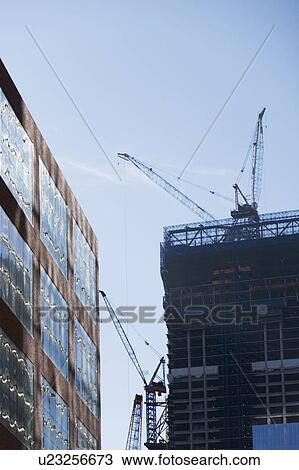 Stock Image - Usa, New York State, New York City, low angle view of construction site. Fotosearch