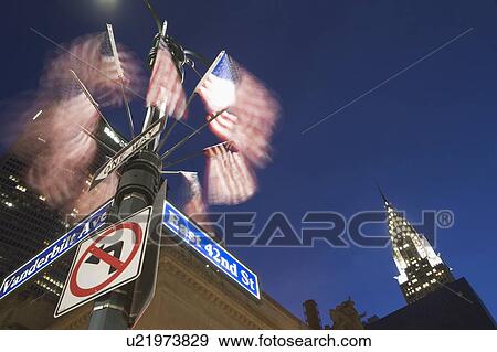Stock Photo - USA, New York State, New York City, low angle view of Chrysler Building and street name sign. Fotosearch