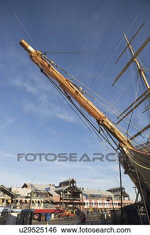 Stock Photograph - USA, New York State, New York City, low angle view of sailing ship mast. Fotosearch